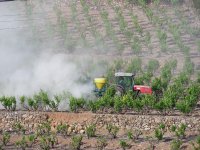 Tractor spraying fields Tractor spraying fields